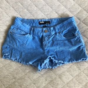 Blue corduroy cut edge shorts with red detail